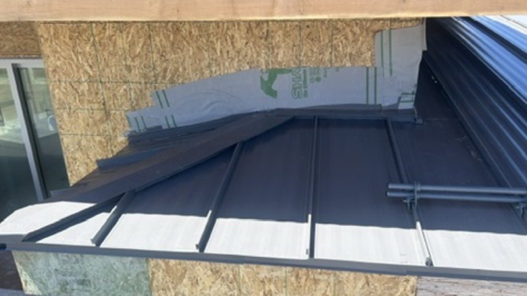 Standing seam metal roof installation